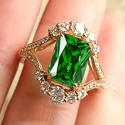 Anello dorato con cristallo verde rettangolare - Lorien