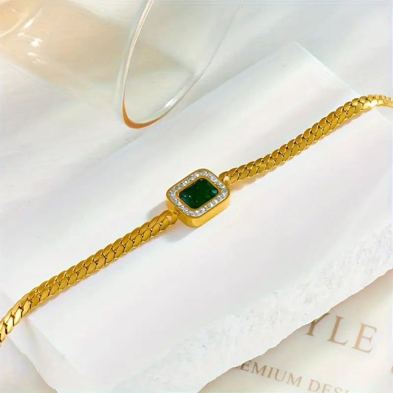 Bracciale dorato con cristallo rettangolare verde - Liriel