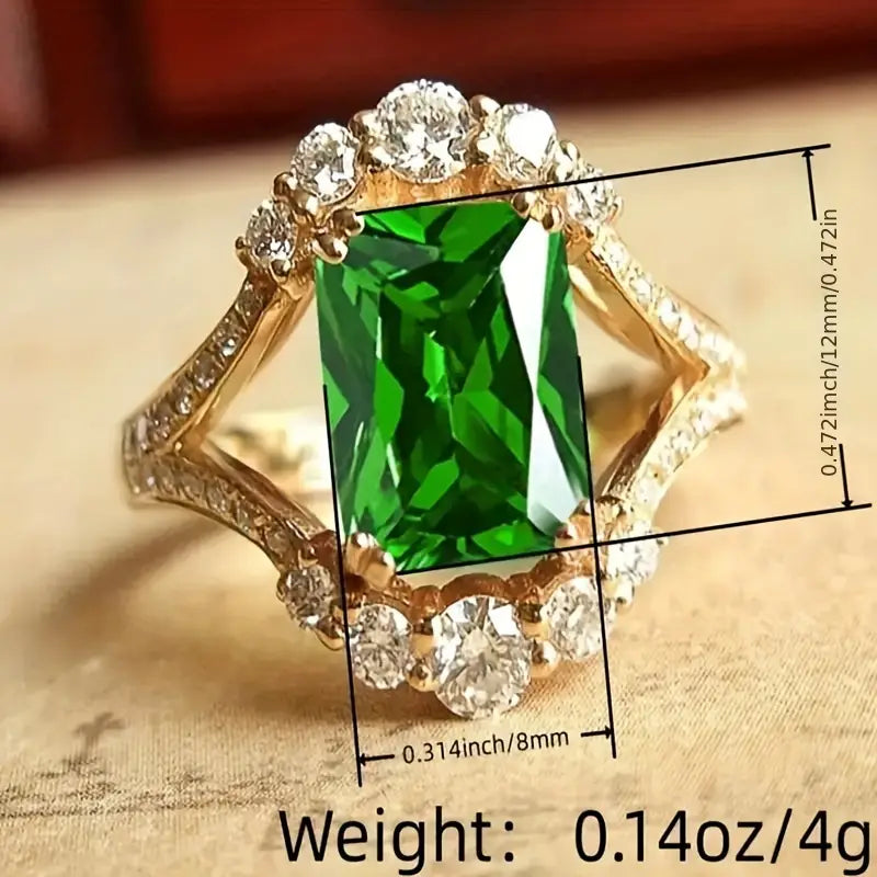 Anello dorato con cristallo verde rettangolare - Lorien