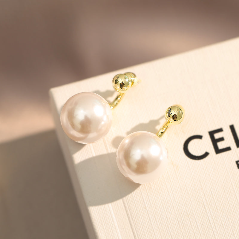 Orecchini tondi dorati - Bianca