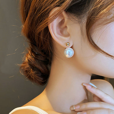 Orecchini tondi dorati - Bianca