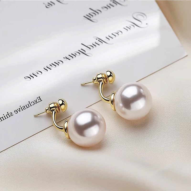 Orecchini tondi dorati - Bianca