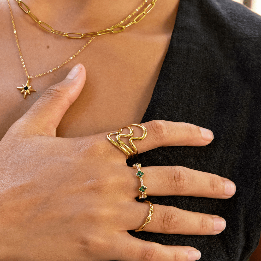 Anello da donna a onde intrecciate in lega dorata - Zita