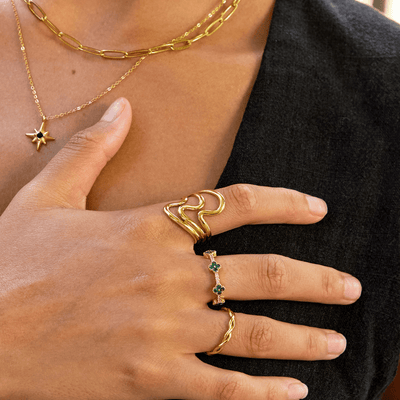 Anello da donna a onde intrecciate in lega dorata - Zita