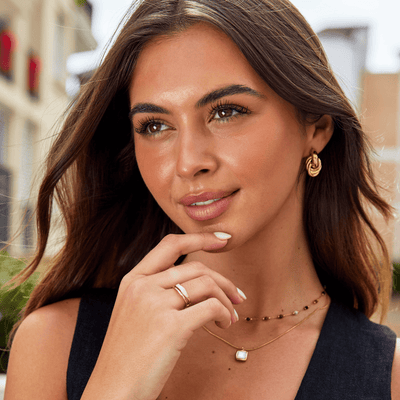 Anello in lega dorata con doppia fascia ondulata - Sahara