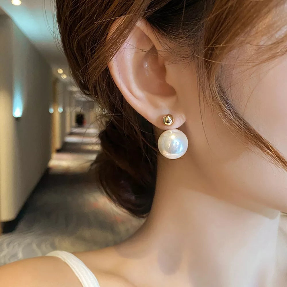 Orecchini tondi dorati - Bianca